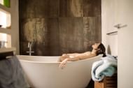 Try cold bath. (Image via Pexels/Andrea Piacquadio)